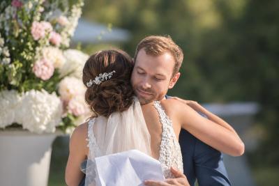 Bride embracing the groom during an emotional moment